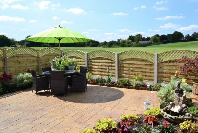 Arched lattice top continental fence panels installation
