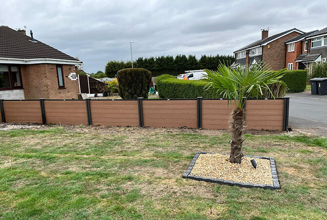 Teak composite fencing with midnight black composite posts