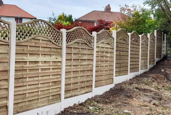 Concrete Intermediate Posts With Timber Fencing