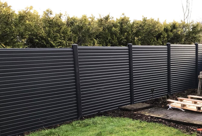 Black woodgrain wrapped UPVC fence panels & posts