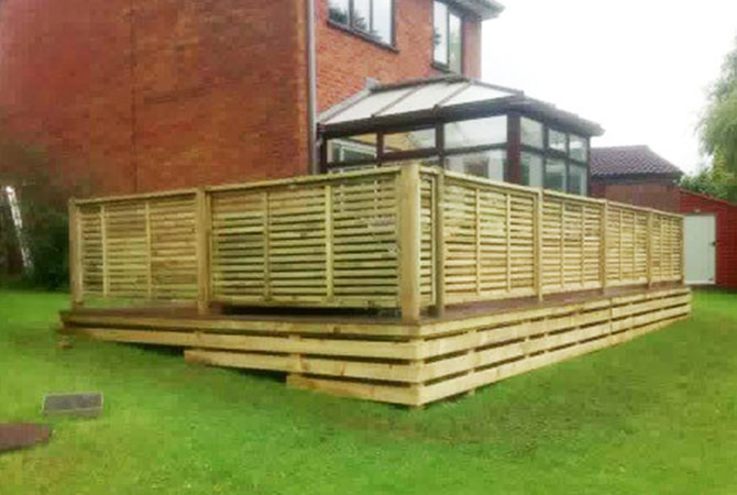 Slatted lattice used as handrail on decking