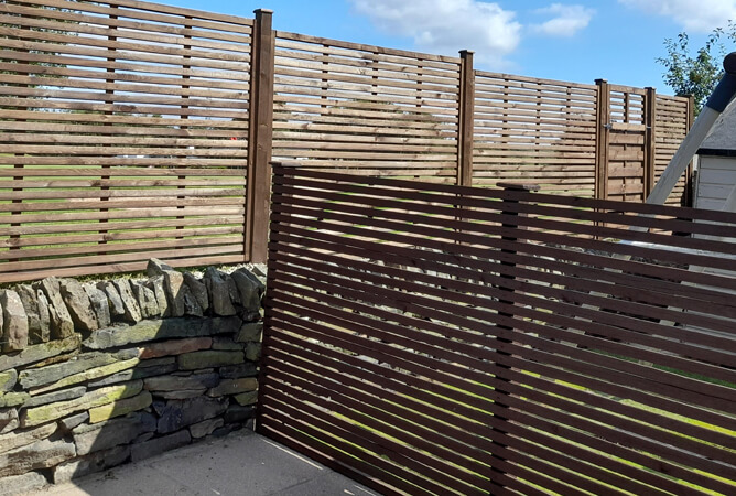 Slatted lattice panels as a screen and a fence