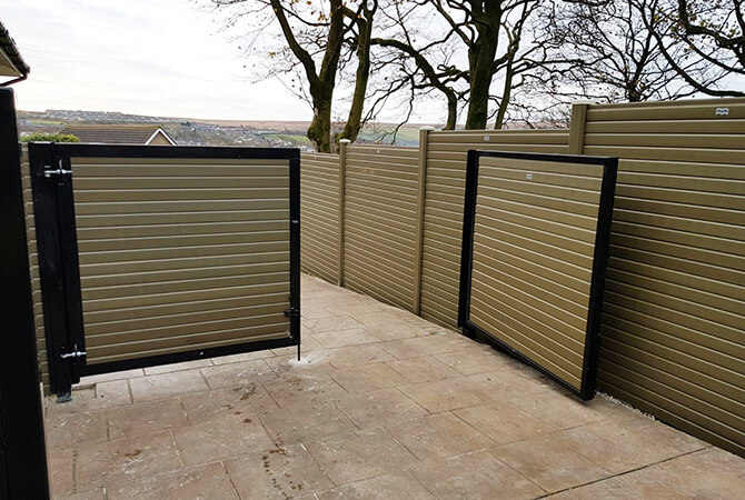 Sage green UPVC composite fence panels and posts