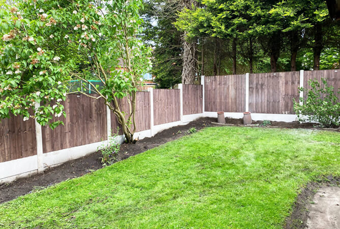 Vertical lap fencing installed all around the customer's property