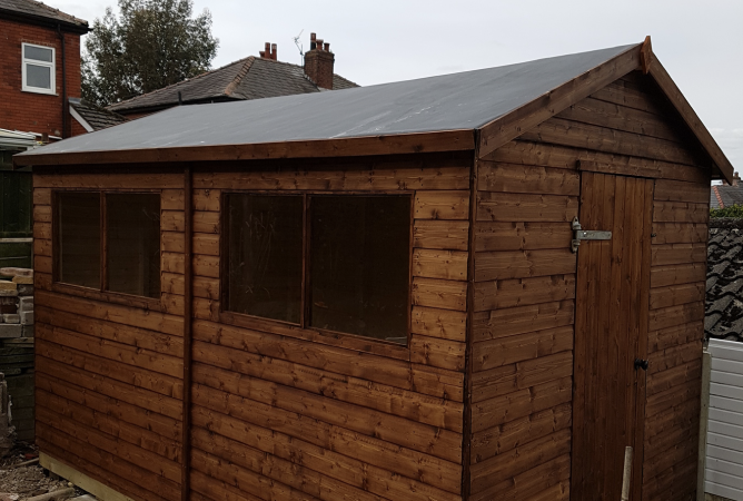 12ft x 8ft Major shed treated in our dark brown oil based preservative