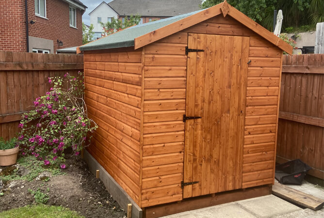 8ft x 6ft Norfolk shed treated in Summer Tan