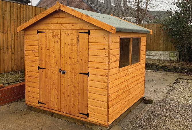 Double door Surrey shed treated in Summer Tan