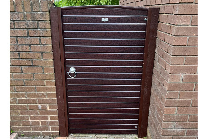 Woodgrain wrapped UPVC gate in Rosewood