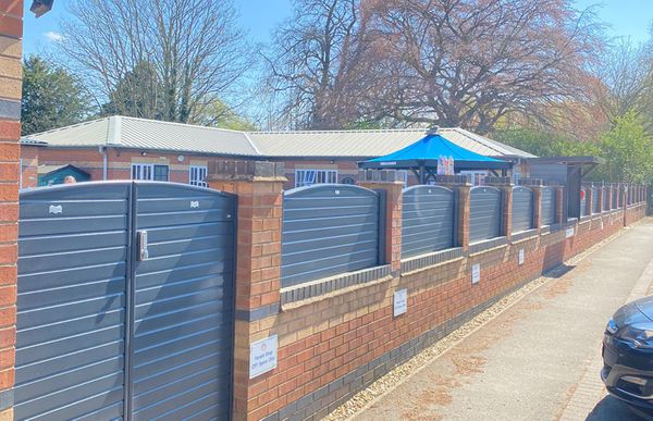 Bow Top Woodgrain Wrapped UPVC Fence Panels